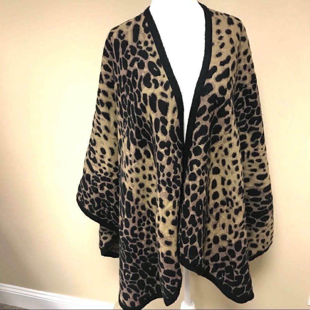 - Charlie Paige oversized animal print shawl.